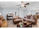 Spacious living room with hardwood floors, stylish furniture, and abundant natural light perfect for modern living at 4 Catawba Ct., Myrtle Beach, SC 29588