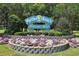 Inviting Myrtle Beach welcome sign surrounded by colorful flowers and manicured landscaping at 4 Catawba Ct., Myrtle Beach, SC 29588