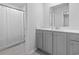 Bright bathroom featuring a single sink vanity with modern fixtures and a shower at 4005 Sweetspire Court, Conway, SC 29526