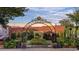 Inviting entrance to Kingston Park, featuring lush greenery and outdoor seating areas at 4005 Sweetspire Court, Conway, SC 29526