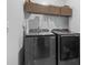 Laundry room featuring front load washer and dryer with shelving for storage at 4005 Sweetspire Court, Conway, SC 29526