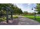 Picturesque community walking path with swing, lush greenery, and a tranquil waterfront view at 4005 Sweetspire Court, Conway, SC 29526