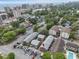 Aerial view of property and neighborhood featuring mature landscaping and ocean views at 401 77Th Ave. N # 11, Myrtle Beach, SC 29572