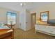 Inviting bedroom with twin bed, large closet, and dresser with TV at 401 77Th Ave. N # 11, Myrtle Beach, SC 29572