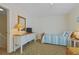 Comfortable bedroom with twin bed, dresser, and a serene atmosphere at 401 77Th Ave. N # 11, Myrtle Beach, SC 29572