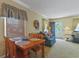 Cozy dining area connecting to the living room, bathed in natural light at 401 77Th Ave. N # 11, Myrtle Beach, SC 29572