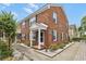 Charming brick exterior featuring manicured landscaping and a welcoming entrance with white columns at 401 77Th Ave. N # 11, Myrtle Beach, SC 29572