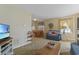 Inviting living room featuring comfortable seating, a dining area, and neutral color palette at 401 77Th Ave. N # 11, Myrtle Beach, SC 29572