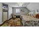 Cozy bedroom featuring twin beds, a ceiling fan, and a decorative rug, creating a comfortable and inviting space at 407 15Th Ave. S, North Myrtle Beach, SC 29582