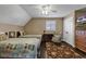 Bedroom with two beds, ceiling fan, TV, and closet creating a comfortable and functional living space at 407 15Th Ave. S, North Myrtle Beach, SC 29582