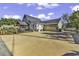 Charming home with a spacious driveway and a two-car garage, perfect for Gathering living at 407 15Th Ave. S, North Myrtle Beach, SC 29582