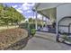 Charming front porch with seating surrounded by lush greenery, creating a welcoming and inviting entry to the home at 407 15Th Ave. S, North Myrtle Beach, SC 29582