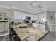 Kitchen island with granite countertop, stool seating, modern appliances, and open layout at 407 15Th Ave. S, North Myrtle Beach, SC 29582