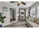 Bright sunroom with comfortable seating, built-in shelving, and plenty of natural light at 407 15Th Ave. S, North Myrtle Beach, SC 29582
