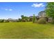 Spacious green backyard featuring expansive lawn and various trees at 4084 Hagwood Circle, Conway, SC 29526