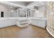 Large primary bathroom with double sinks, soaking tub, and glass block window at 4084 Hagwood Circle, Conway, SC 29526