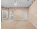 Bedroom featuring neutral carpets, light walls with lighthouse themed border, and multiple entryways at 4084 Hagwood Circle, Conway, SC 29526