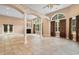Spacious living room featuring a cozy fireplace, built-in shelving, and multiple windows for natural light at 4084 Hagwood Circle, Conway, SC 29526