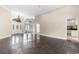 Open-concept living area boasting tile floors, tall ceilings, and seamless flow between spaces, perfect for entertaining at 4084 Hagwood Circle, Conway, SC 29526