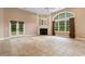 Spacious living room with fireplace, built-in shelves, and French doors to the outside at 4084 Hagwood Circle, Conway, SC 29526