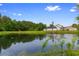 Scenic view of a tranquil pond reflecting the sky and surrounding trees at 4084 Hagwood Circle, Conway, SC 29526