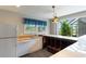 This recreation room features a wet bar with refrigerator, dishwasher, and a sink at 4084 Hagwood Circle, Conway, SC 29526