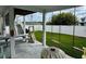 Outdoor area with covered patio featuring swings and a picnic table at 412 29Th Ave. N, North Myrtle Beach, SC 29582