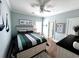 Cozy bedroom with hardwood floors and neutral decor at 412 29Th Ave. N, North Myrtle Beach, SC 29582