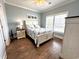 Bright bedroom with ceiling fan, hardwood floors and beach themed decor at 412 29Th Ave. N, North Myrtle Beach, SC 29582