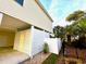 Side yard with a privacy fence and mature landscaping at 412 29Th Ave. N, North Myrtle Beach, SC 29582