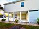 Ground level view of exterior featuring a covered entertainment area and mature landscaping at 412 29Th Ave. N, North Myrtle Beach, SC 29582