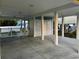 Covered ground-level view showing an entertainment area with lighting and privacy screens at 412 29Th Ave. N, North Myrtle Beach, SC 29582