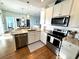 Modern kitchen with stainless steel appliances and open to the dining and living areas at 412 29Th Ave. N, North Myrtle Beach, SC 29582