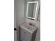 Bathroom featuring a sleek vanity with a lighted mirror above the sink at 418 C Tree Top Ct. # 0, Myrtle Beach, SC 29588