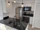 Stylish kitchen with stainless steel appliances, sleek countertops, and a brick backsplash for a modern look at 418 C Tree Top Ct. # 0, Myrtle Beach, SC 29588