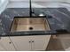 Elegant kitchen island showcasing dark granite countertops and a sleek stainless steel sink at 418 C Tree Top Ct. # 0, Myrtle Beach, SC 29588