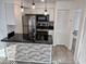 Charming kitchen featuring stainless appliances, granite counters and updated cabinetry at 418 C Tree Top Ct. # 0, Myrtle Beach, SC 29588