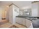 The kitchen features white cabinets, ample counter space, and an adjoining dining area at 4200 Coquina Harbour Dr. # H5, Little River, SC 29566