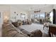 Cozy living room with sliding glass doors, comfortable furniture, and natural light at 4200 Coquina Harbour Dr. # H5, Little River, SC 29566