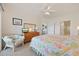 The spacious bedroom offers neutral walls, comfortable seating and plush carpet at 4200 Coquina Harbour Dr. # H5, Little River, SC 29566