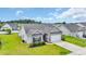 Well-maintained home with a two-car garage and a neat lawn in a peaceful neighborhood at 4200 Woodcliffe Dr., Conway, SC 29526