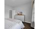 Bright bedroom featuring a dresser with a TV on top of a hardwood floor at 4200 Woodcliffe Dr., Conway, SC 29526