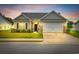 Charming single-Gathering home featuring a two-car garage and a well-manicured front lawn at 4200 Woodcliffe Dr., Conway, SC 29526