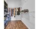 Walk-in closet with built-in shelving for organized storage at 4200 Woodcliffe Dr., Conway, SC 29526