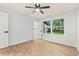 Bright bedroom with natural light, wood-look flooring, and a ceiling fan at 421 Villa Woods Dr., Myrtle Beach, SC 29579