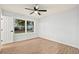 Bright bedroom with natural light, wood-look flooring, and a ceiling fan at 421 Villa Woods Dr., Myrtle Beach, SC 29579