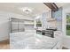 Upgraded kitchen with stainless steel appliances, granite countertops, and decorative tile backsplash at 421 Villa Woods Dr., Myrtle Beach, SC 29579