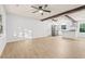 Bright and spacious living area featuring modern wood floors and open layout to the kitchen at 421 Villa Woods Dr., Myrtle Beach, SC 29579