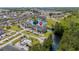 Aerial view of the property highlighting its community pool, a lake, and convenient parking at 4503 W Harbour Ct. # S9, Little River, SC 29566