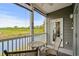 Balcony with seating offers serene water views at 4503 W Harbour Ct. # S9, Little River, SC 29566